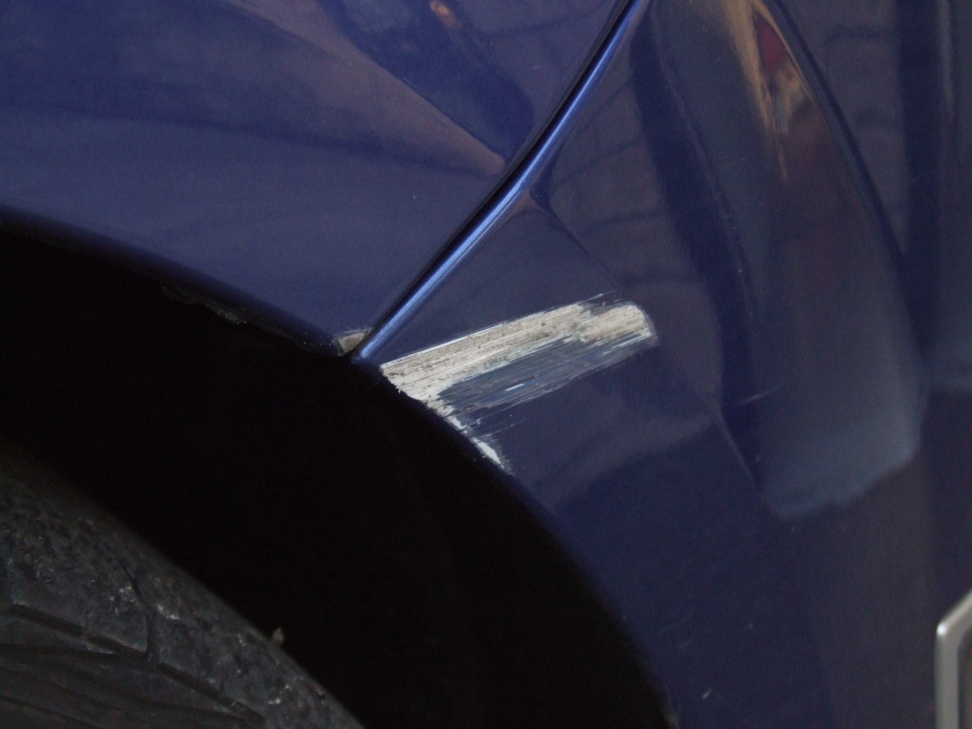 I have dented the corner of the front bumper on the black trim on my