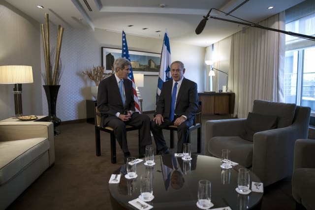 Israel's Prime Minister Benjamin Netanyahu meets with U.S. Secretary of State John Kerry in Berlin