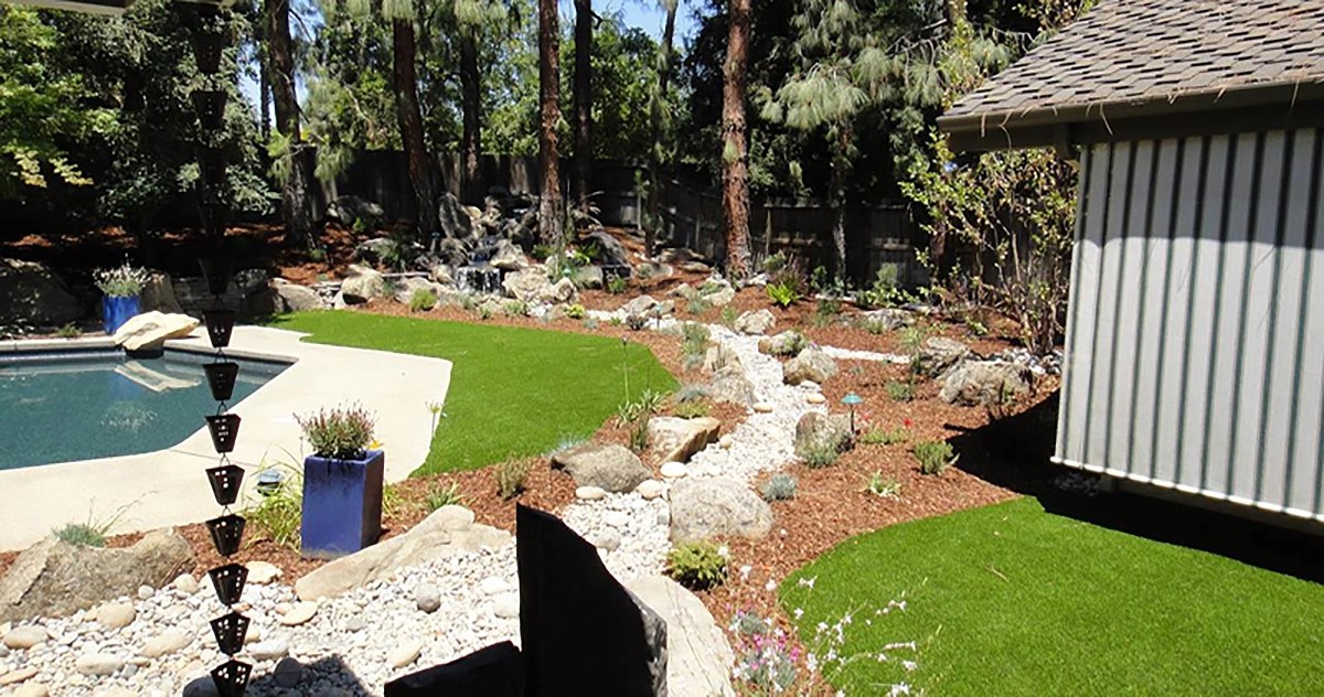 Dry River Bed Landscaping Design - Mike's Evergreen, Inc.