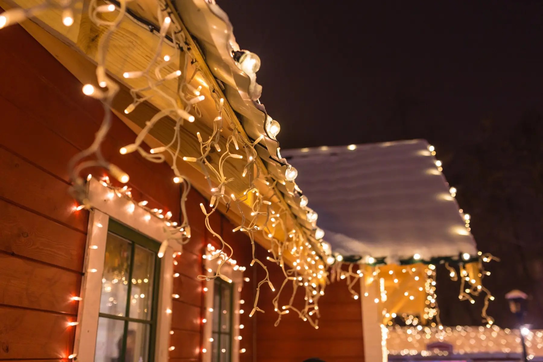 How to Hang Christmas Lights Outdoors and Indoors