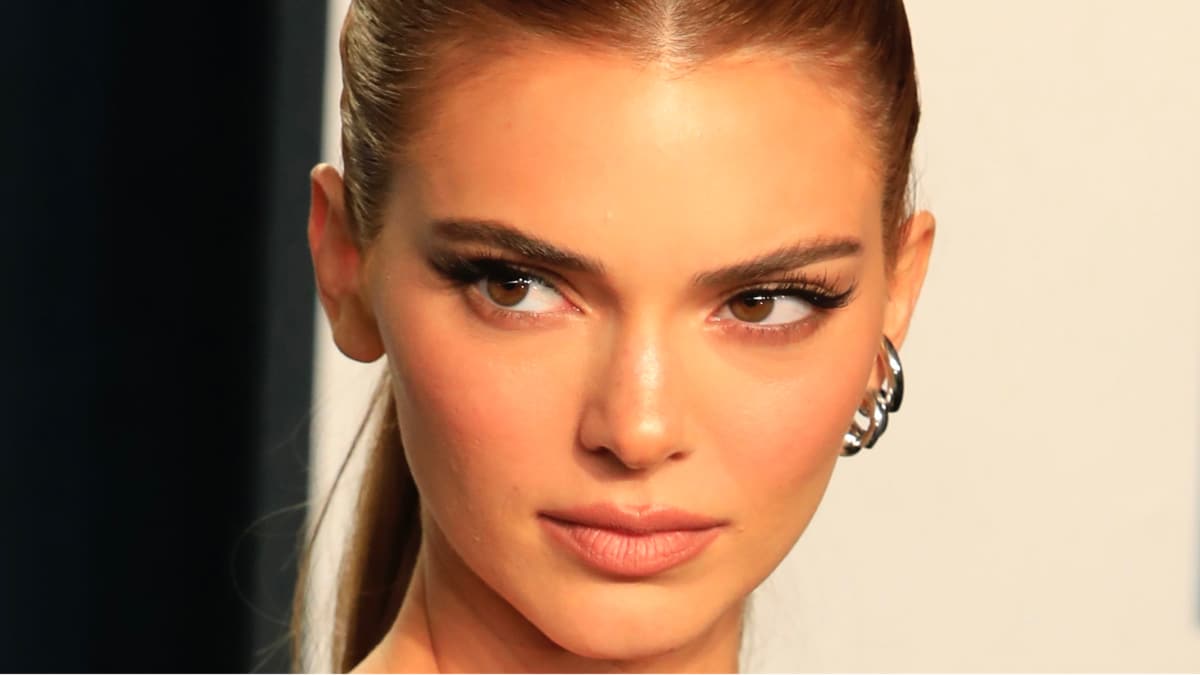 Kendall Jenner shows off slim physique in floral gown