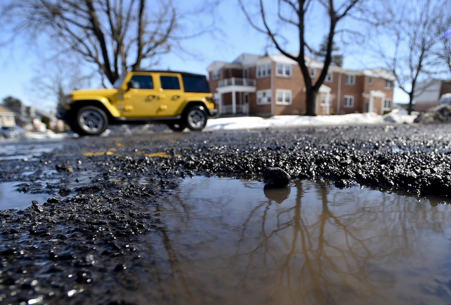 How to Avoid Hitting Potholes and Keep Your Tires and Wheels Protected