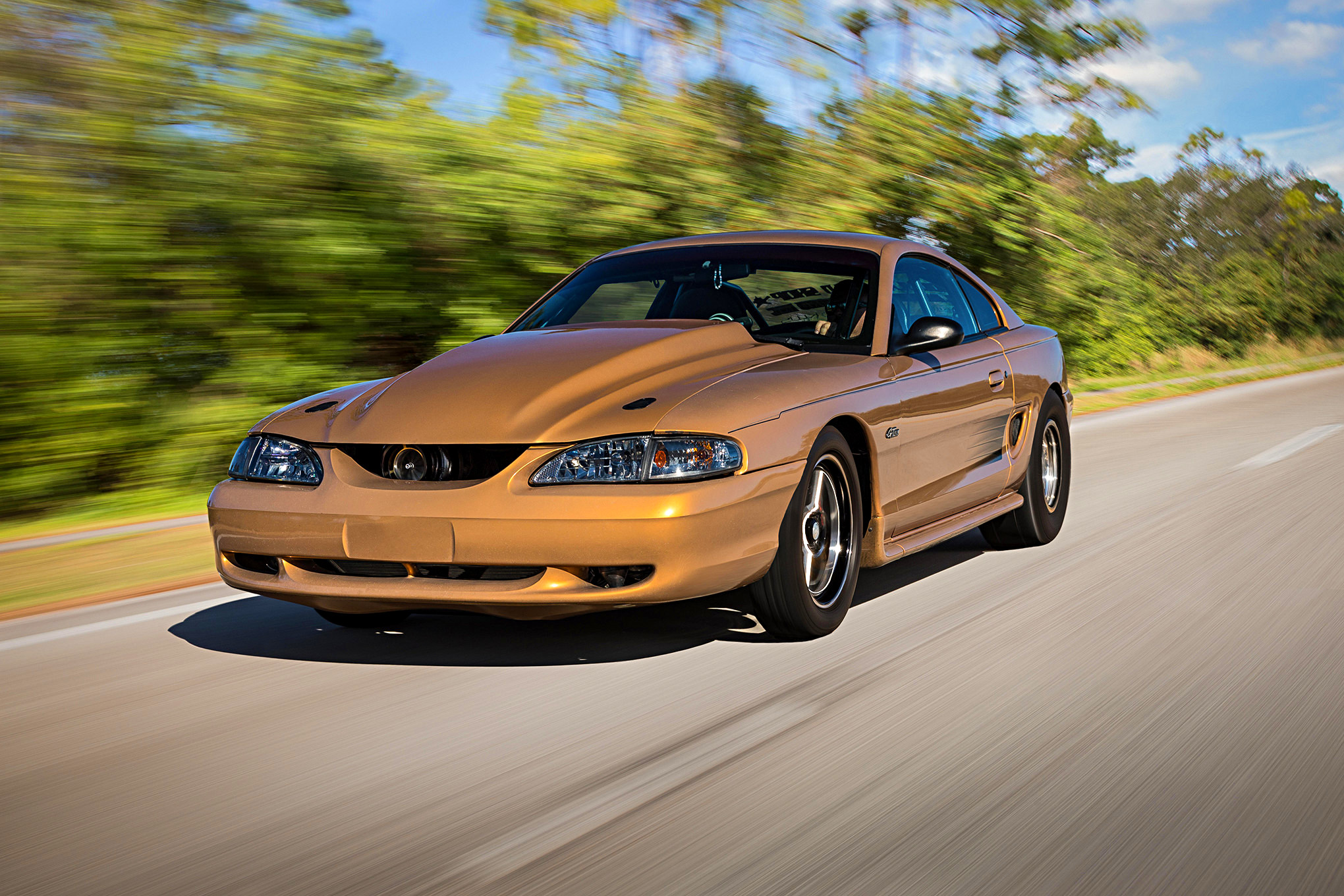 Kurtis Forsberg’s Aztec Gold SN95 Mustang GT was Built to Be a 7Second True Street Contender!
