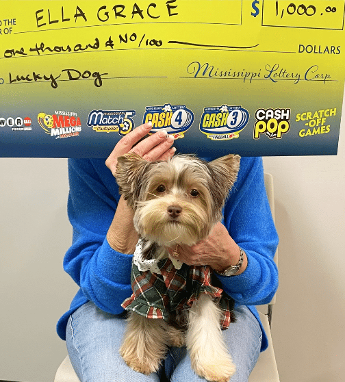 Pelahatchie Woman Won 1,000 & Their Dog’s Face on a ScratchOff Ticket