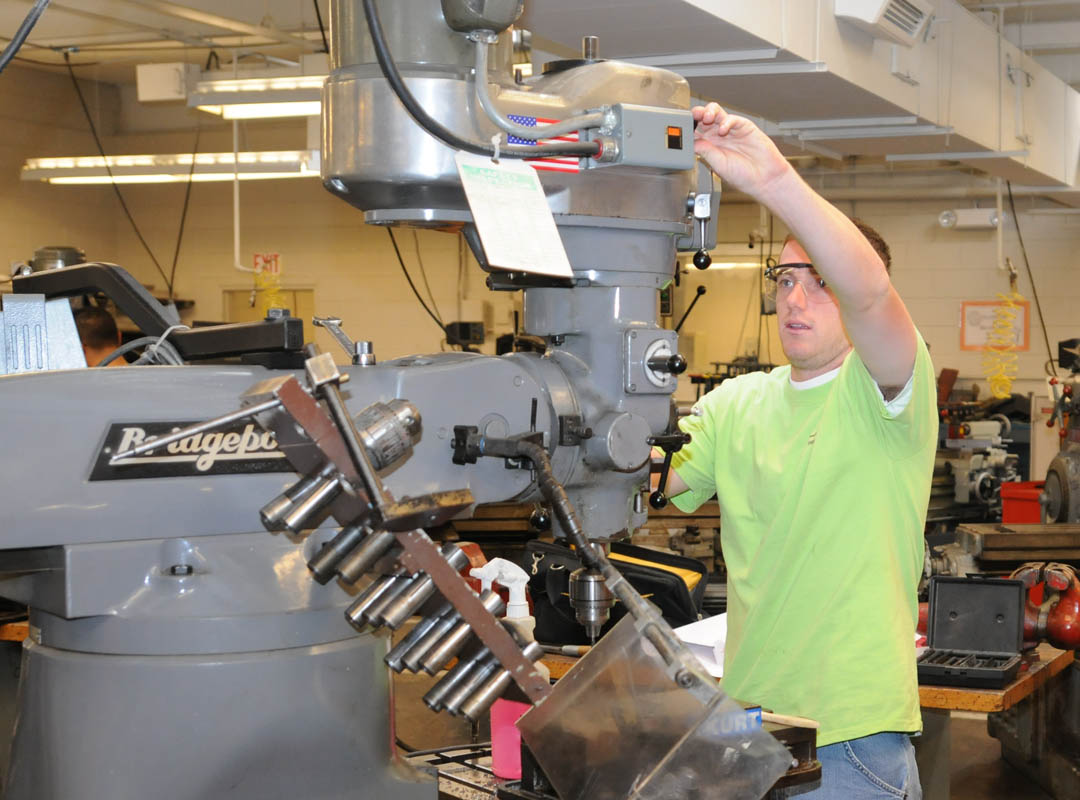 Young man on lathe (2) MSSC(013)