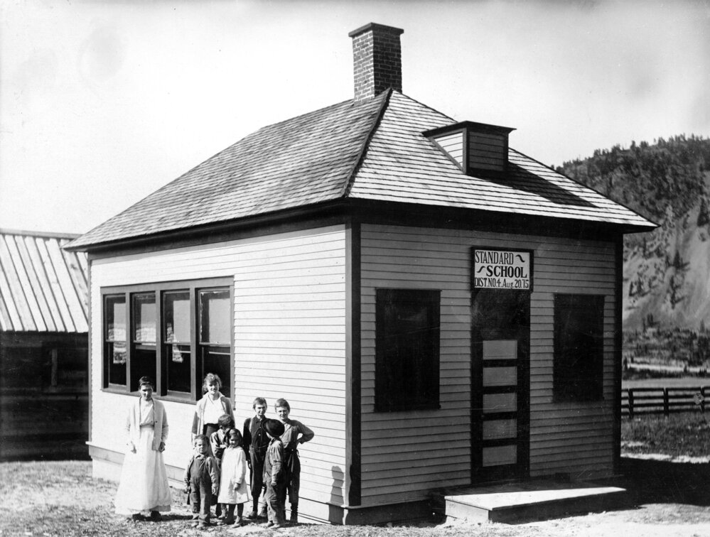 [Students and teacher outside Noxon School]. Montana Memory Project