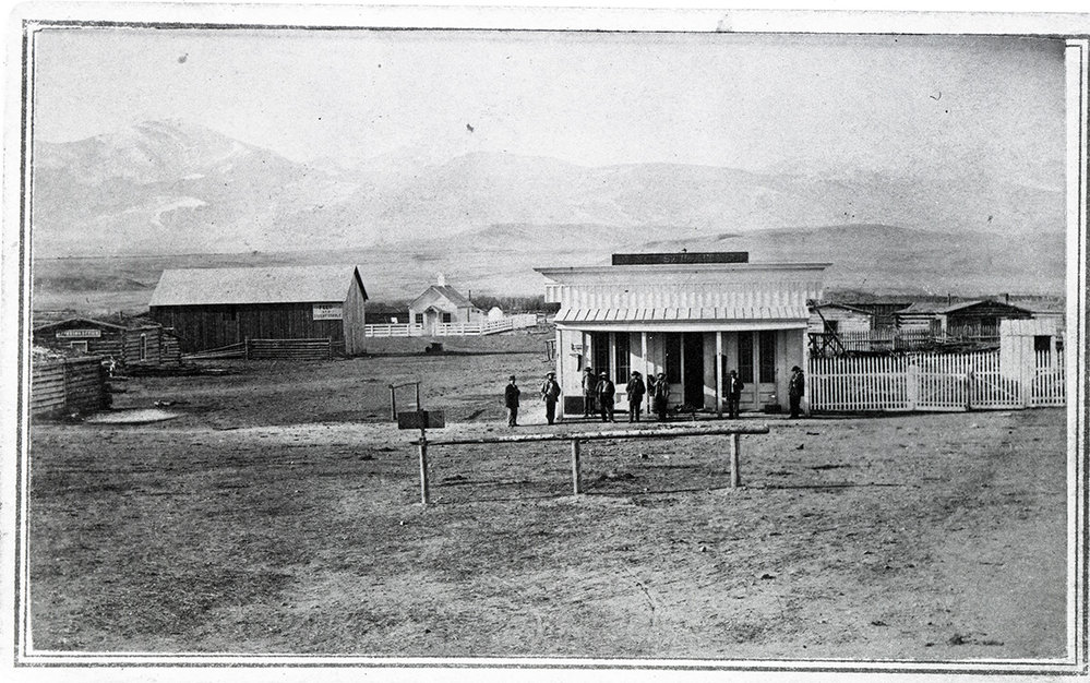 Group in front of a store, Deer Lodge, Montana Montana Memory Project