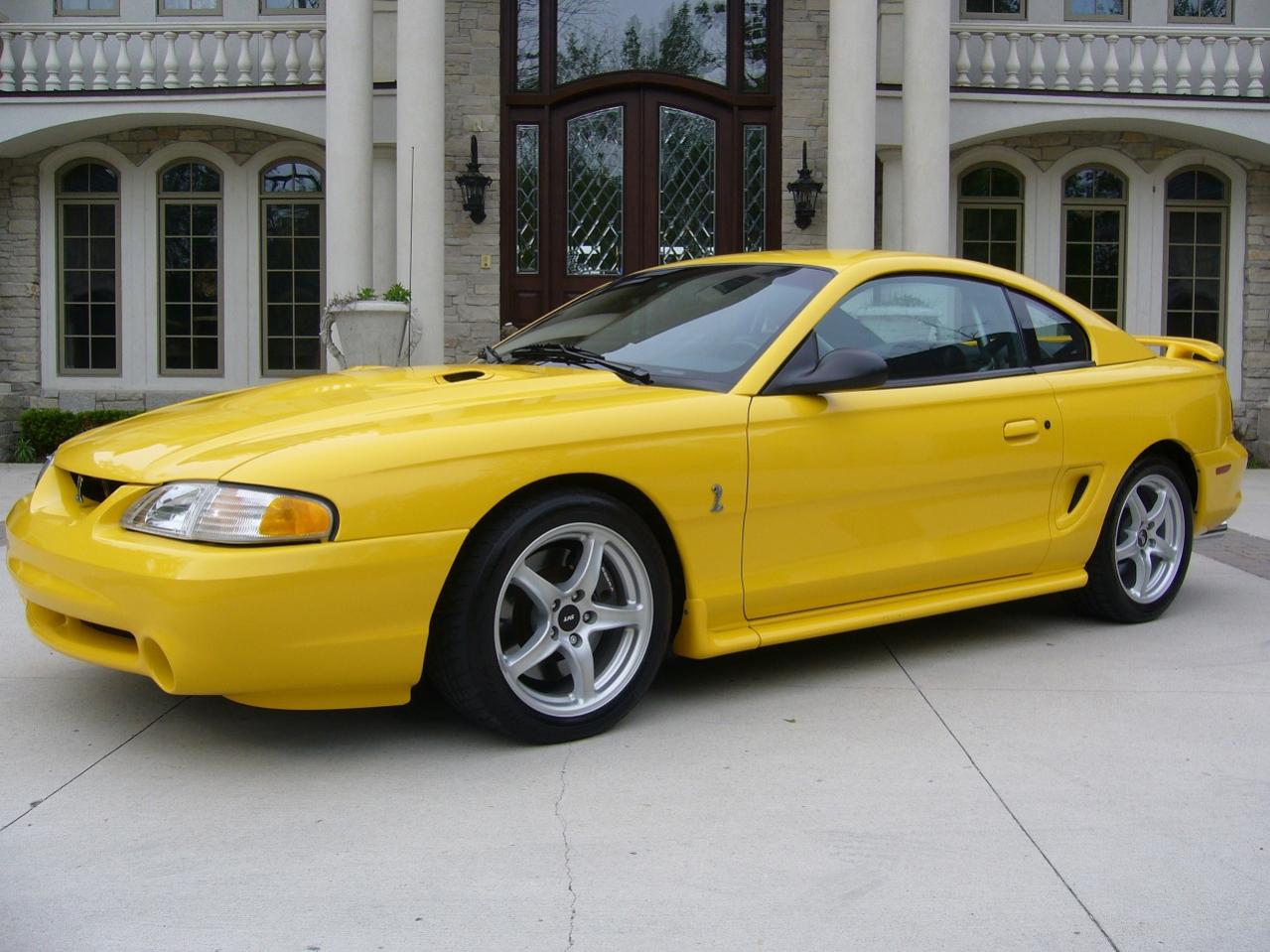 1998 Ford Mustang yellow chrome