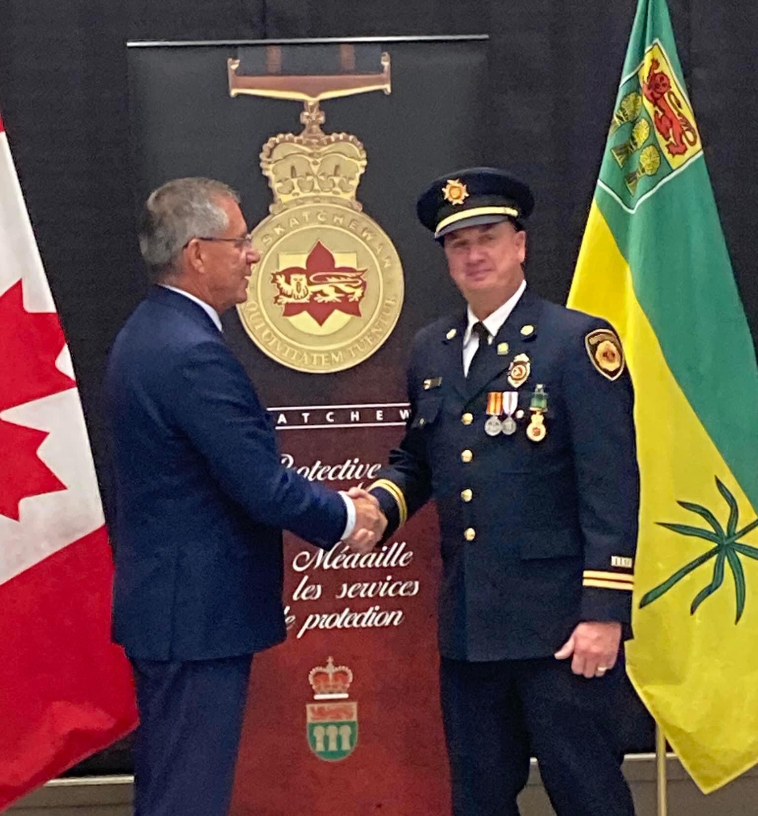 Two Britannia Fire Department members hit 25 years service My