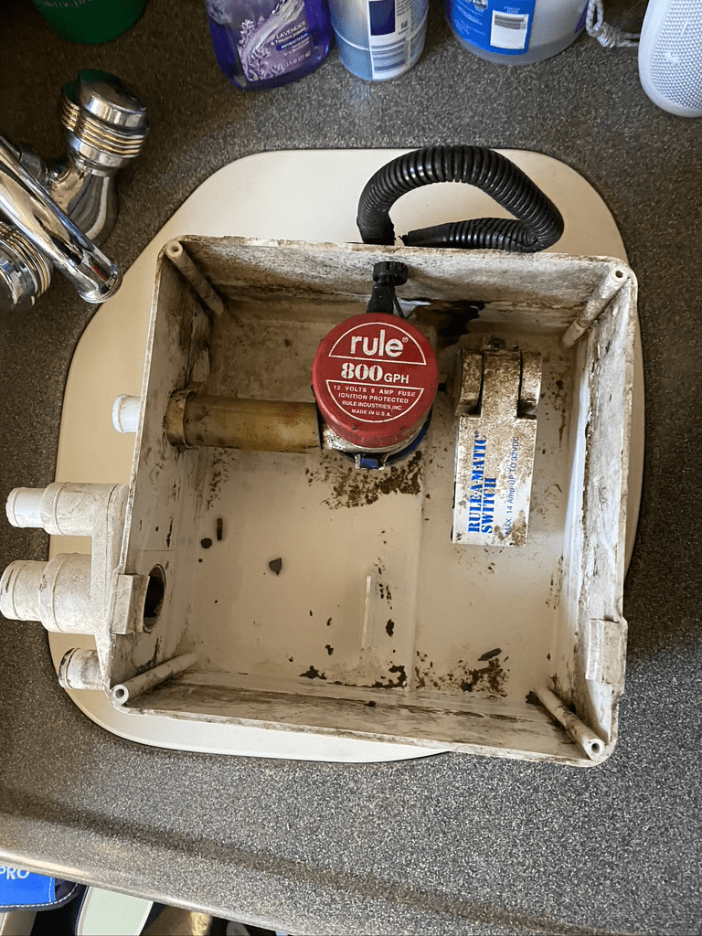 Boat maintenance shower drain sump pump