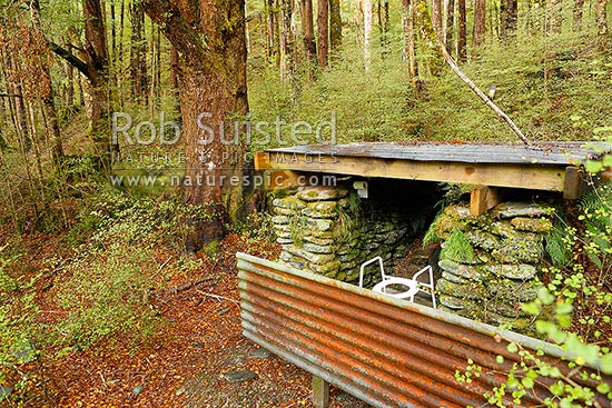 Outdoor toilet and rustic bathroom in beech forest, Pell