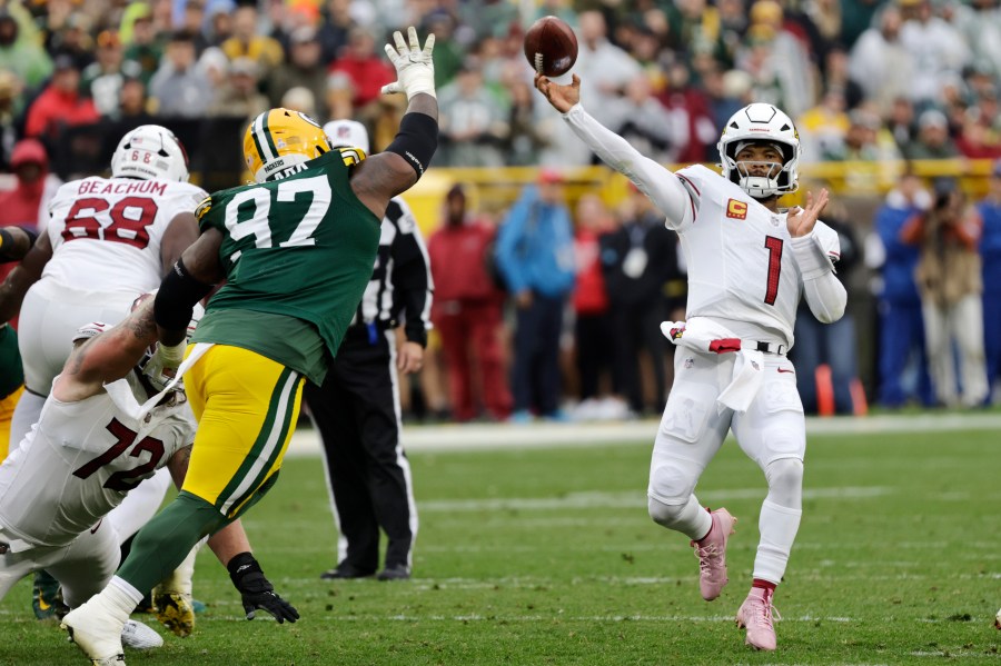 Doubs catches 2 TD passes in his return from suspension to help Packers rout Cardinals 34-13