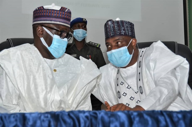 NNPC GMD, Mallam Mele Kyari (left), in a discussion with the Chief Host and Governor of Sokoto State, Rt. Hon. Aminu Waziri Tambuwal (right) at the First Quarter Public Lecture of the Usmanu Danfodiyo University, Sokoto...Monday.