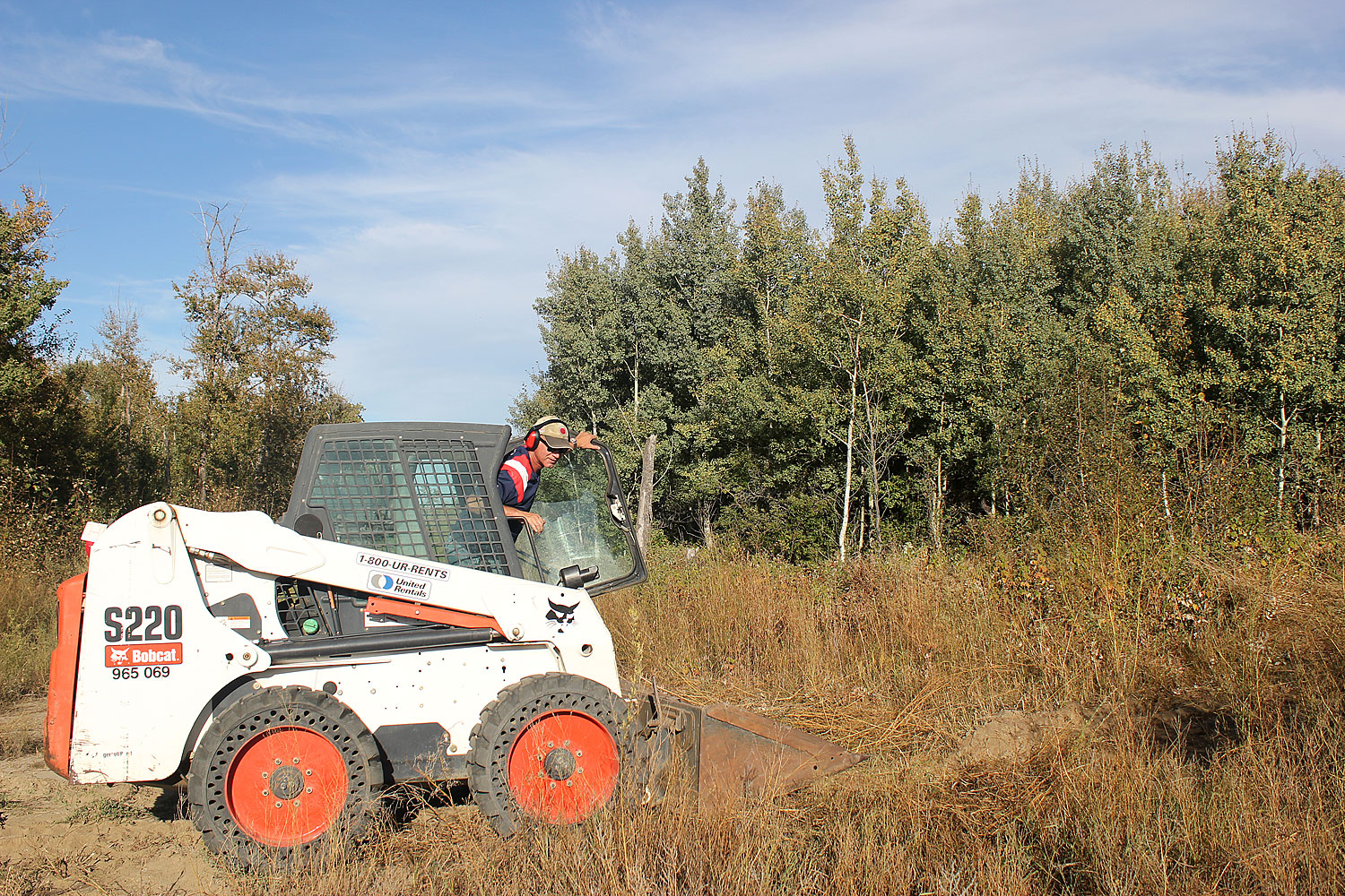 Clearing Land with a Bobcat Nine Bean Rows First time used a Bobcat