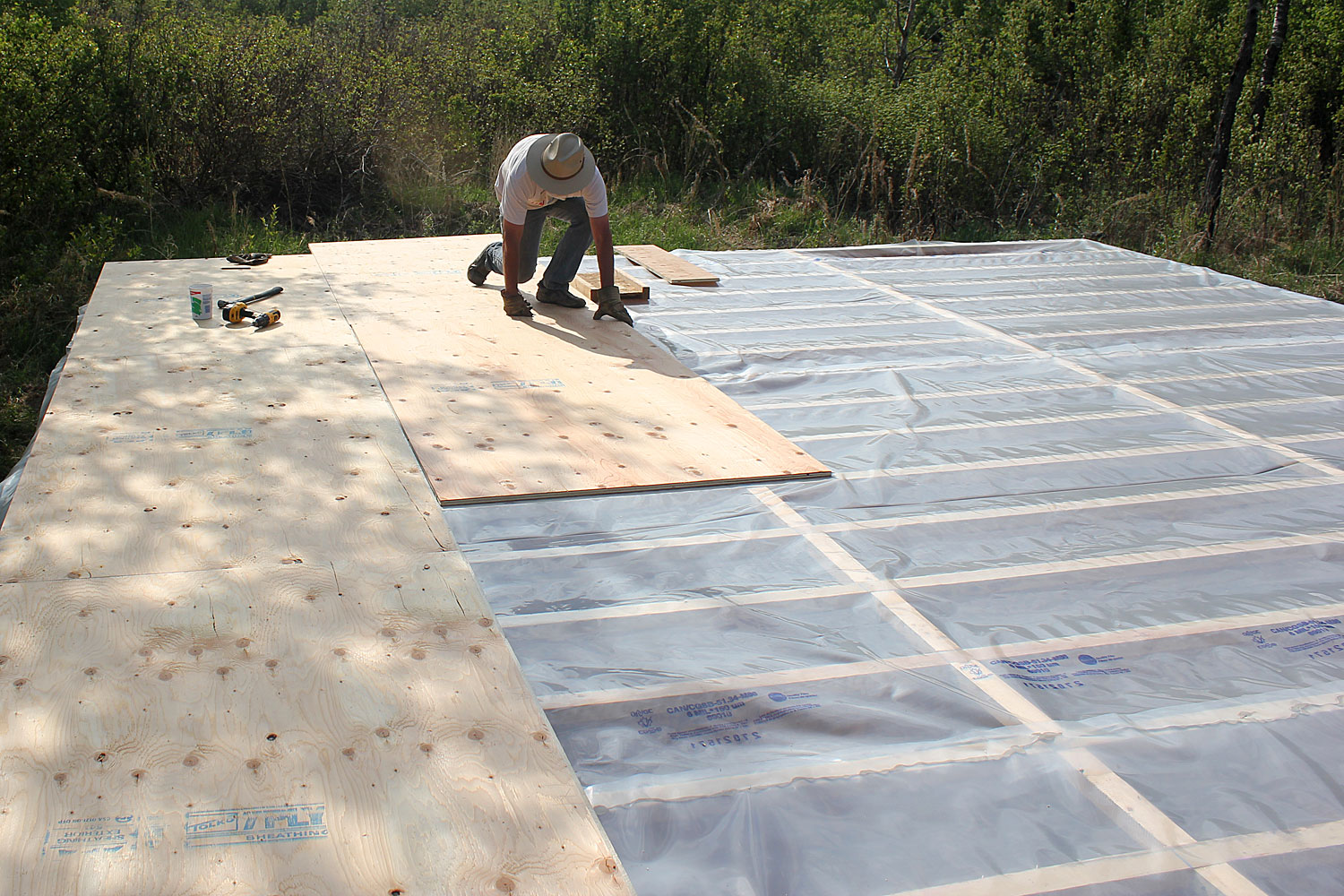 Laying the Cabin Subfloor Nine Bean Rows plywood for cabin subfloor