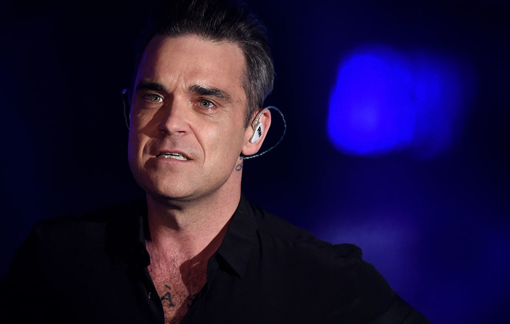 Robbie Williams reveals his father has Parkinson's disease