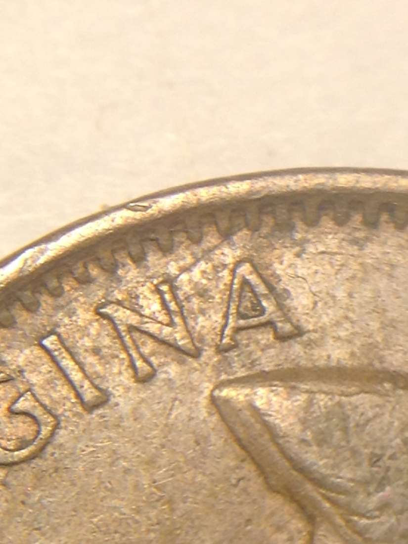 1 cent 1959 coin fendillé sur le n de regina