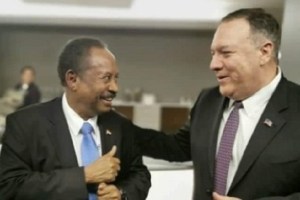 US secretary of state Michael Pompeo [right] gestures with Sudanese Prime Minister Abdallah Hamdok [left] as talk to lift Sudan from list of state sponsor of terrorism continues (Photo via Sudan Tribune)