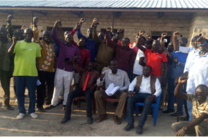 Posted seated from the far left is Mr. Simon Gai Kuol, the newly elected Thiang Nuer Community’s Chairperson along with Mr. Simon Kun Tutkuai, Secretary General(center) and Mr. Paul Puot Manyun, Secretary of Finance (right), Old Fangak.(Photo credit: supplied/Nyamilepedia)