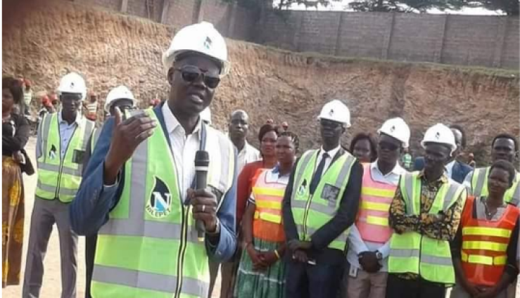 Dr. Chol Deng Thon at the construction site of Nilepet Headquarters in Juba(Photo credit: supplied)