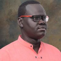 Author of "America Destroyed Me" calls on Machar and Gatwech to reconcile their differences.