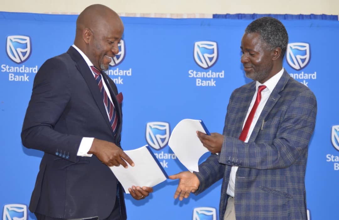 Standard Bank Plc increases scholarship fund with Press Trust to K220