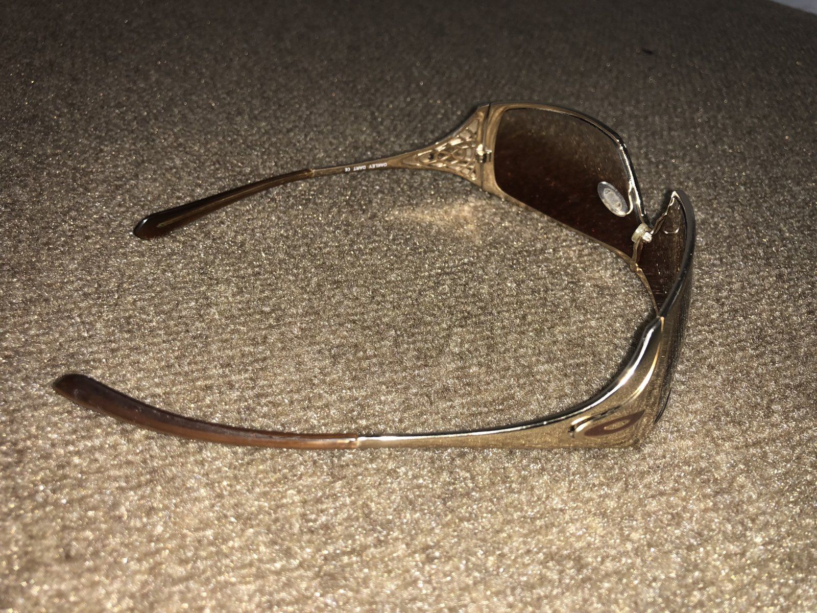 What is the name of these gold frame metal Oakley sunglasses? Oakley