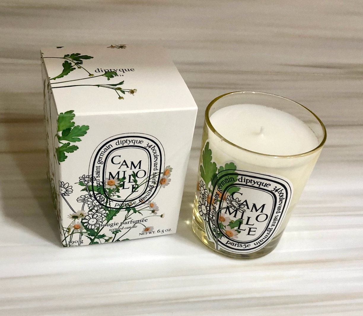 Diptyque Chamomile and Litchi Limited Edition Candles of the comely