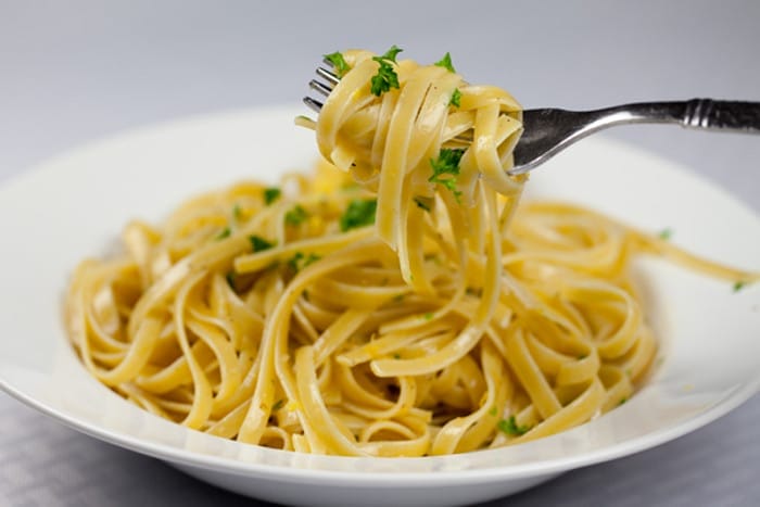 Vegan lemon butter fettuccine with parsley and pine nuts