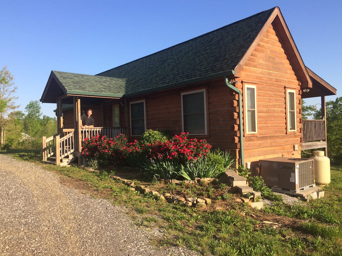 This Log Cabin AirBnB In Tennessee Comes With A 50Foot Waterfall