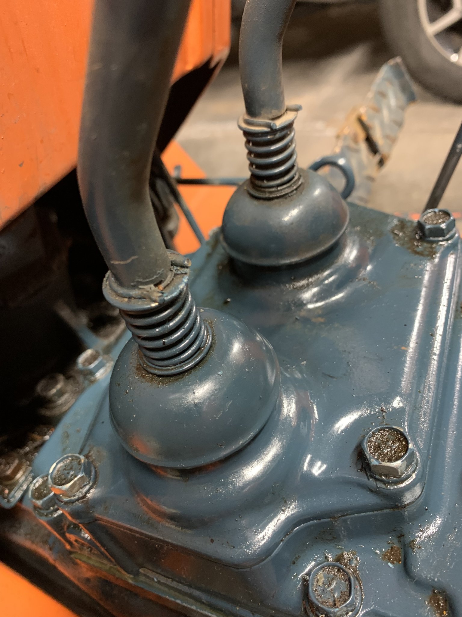 Shifter levers leaking hydraulic fluid from the boots where they enter