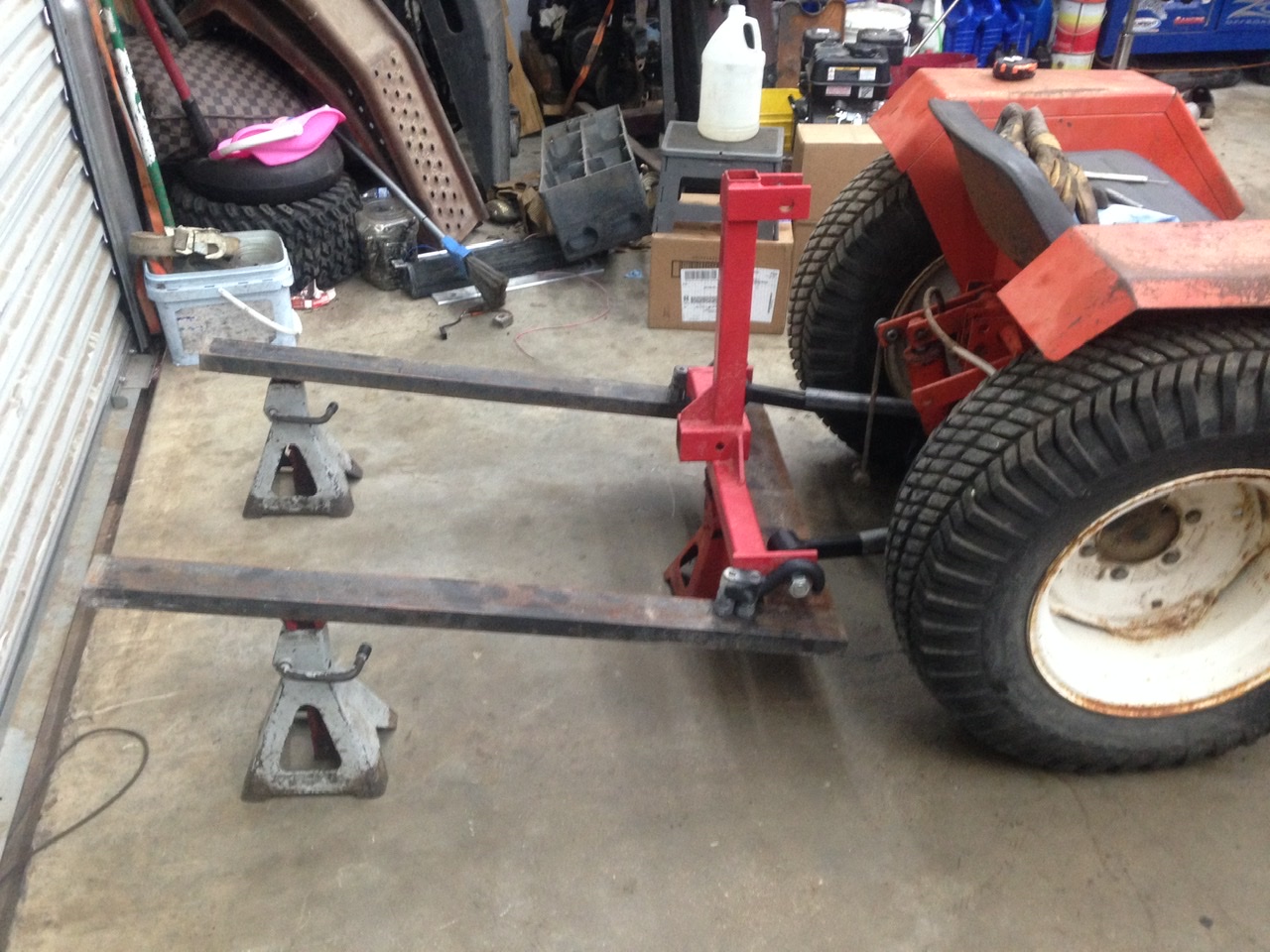 Mounting a trailer hitch ball on the rear of a BX23S
