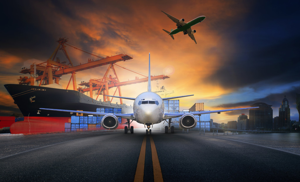 ship loading container in import export pier and air cargo plane
