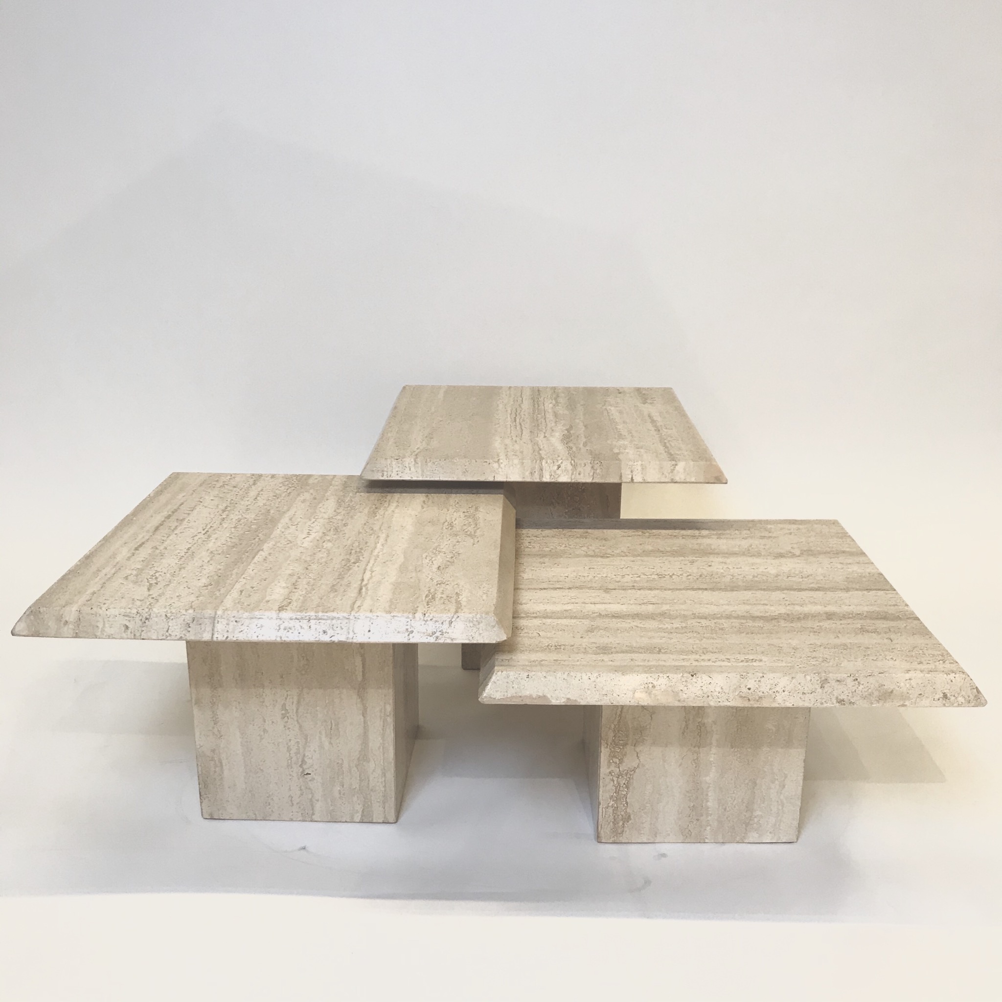 Set of 3 low travertine tables. Circa 1980. Paul Bert Serpette
