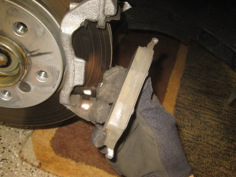 Mini-Cooper-Front-Brake-Pads-Replacement-Guide-013