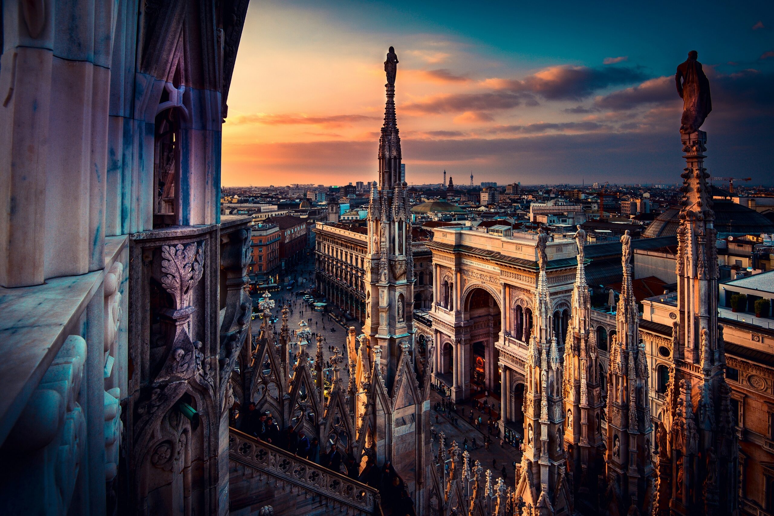 beautiful view at sunset from Duomo cathedral of Milan roof top