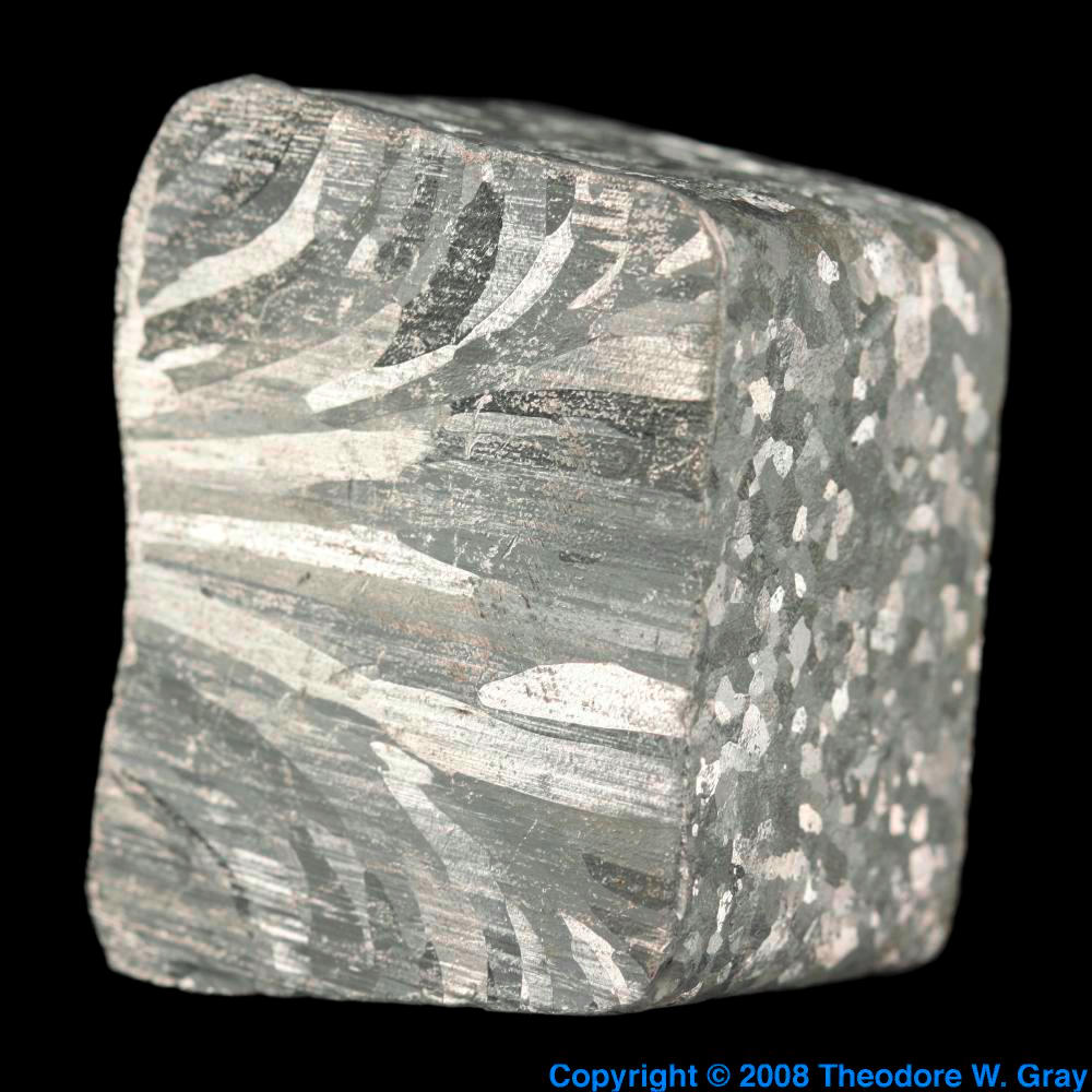 Etched block, a sample of the element Aluminum in the Periodic Table