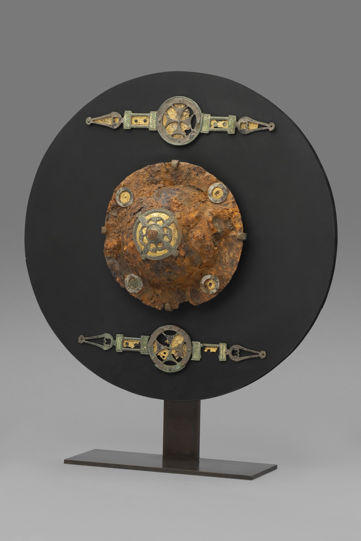 An AngloSaxon Shield Boss and Corresponding Pair of Fittings, c. 650