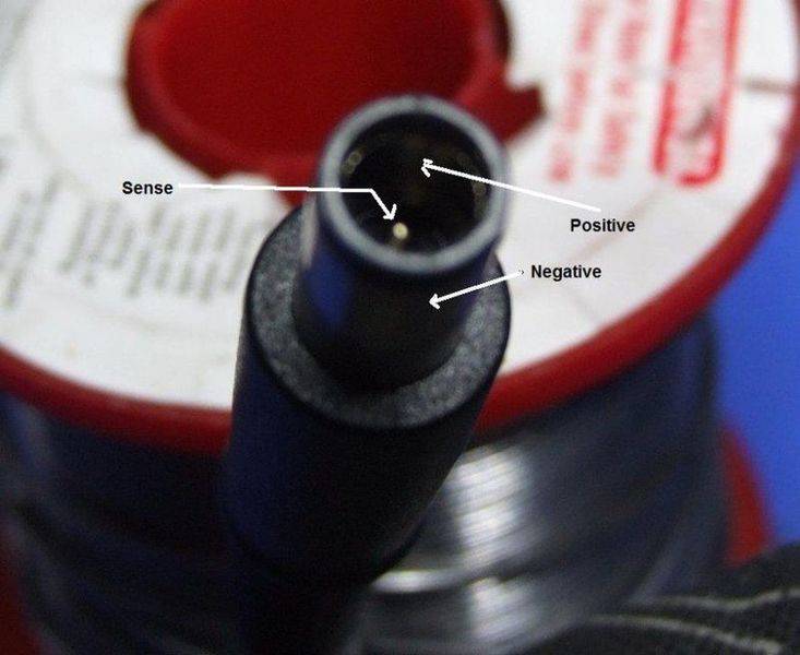 How can a PC detect the AC adapter brand?