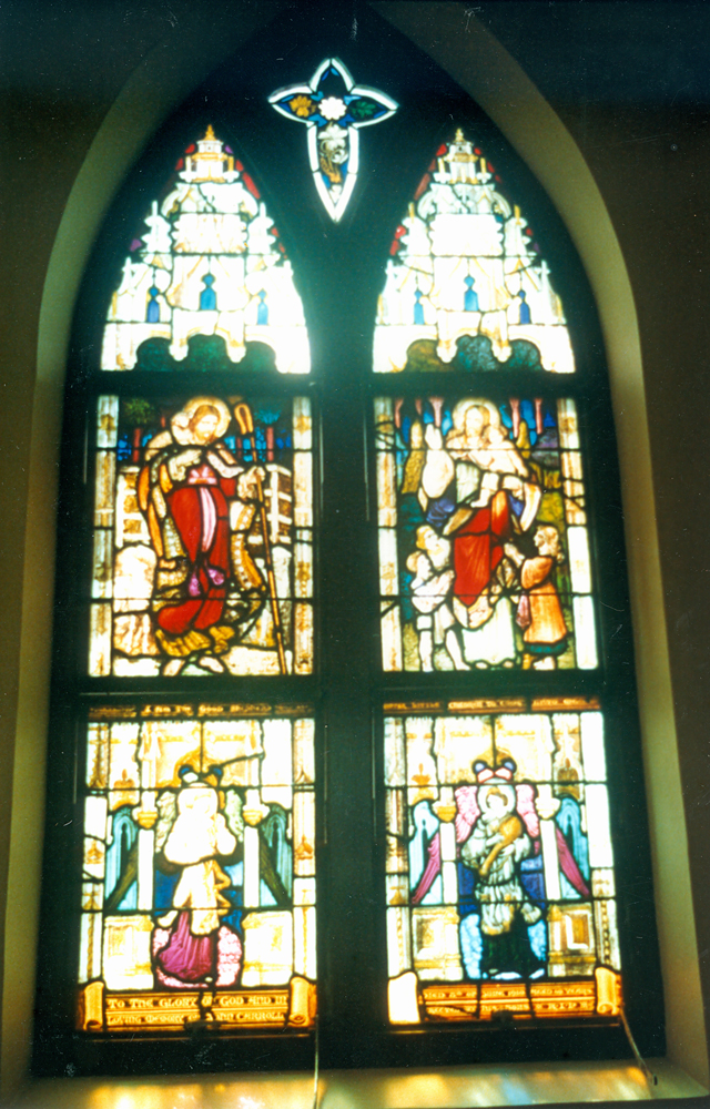 Stained glass window in Saint Francis Xavier Catholic Church, 6 church