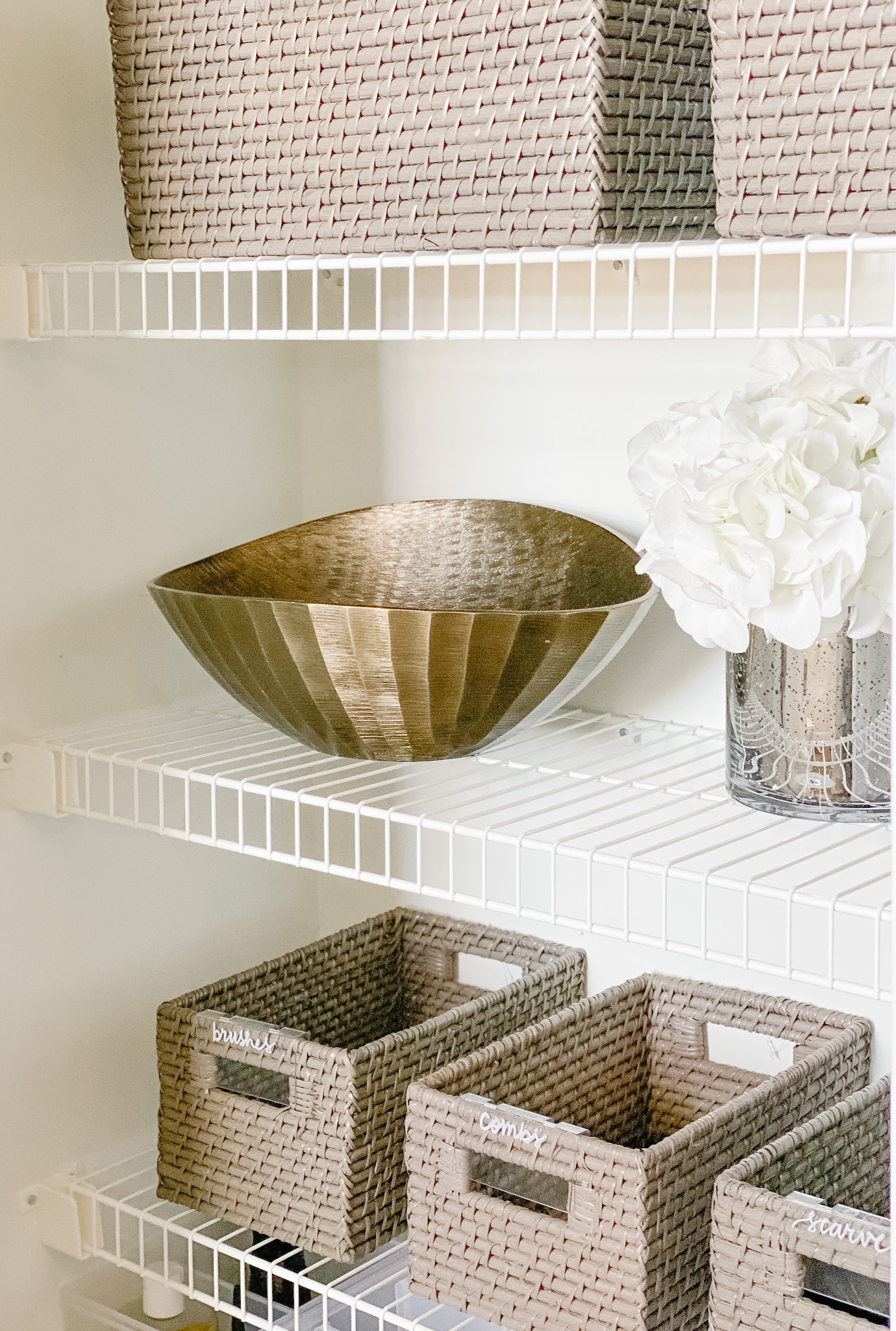 2 Ways to Organize Your Linen Closet Using an Elfa Door Rack Pinch of