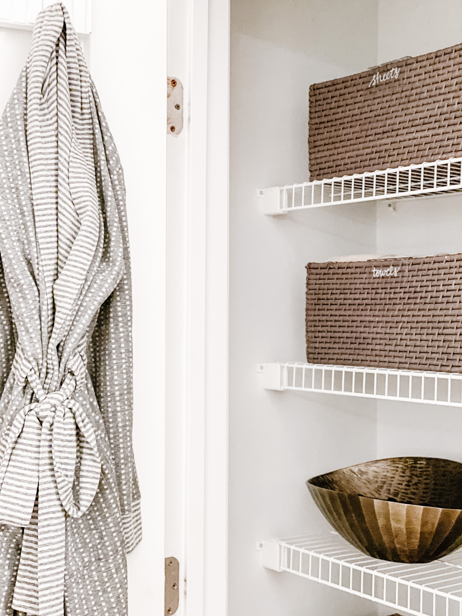 2 Ways to Organize Your Linen Closet Using an Elfa Door Rack Pinch of