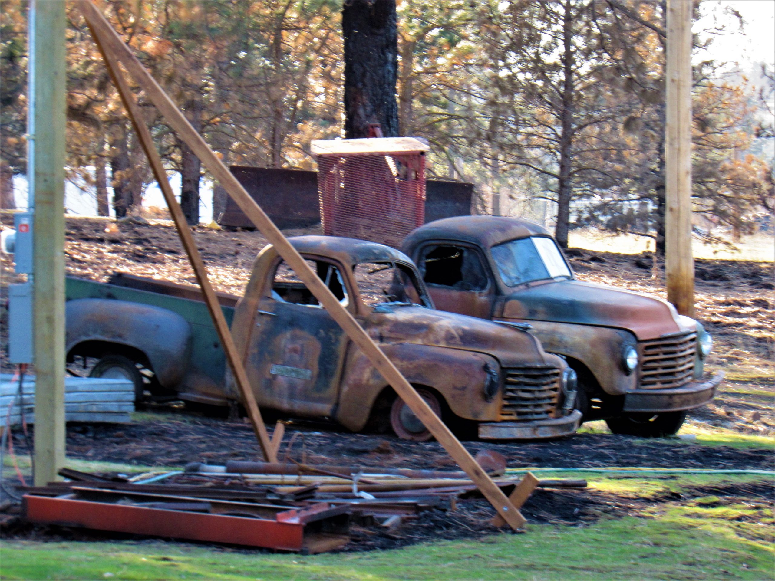 burned trucks malden Pine Creek Community Restoration