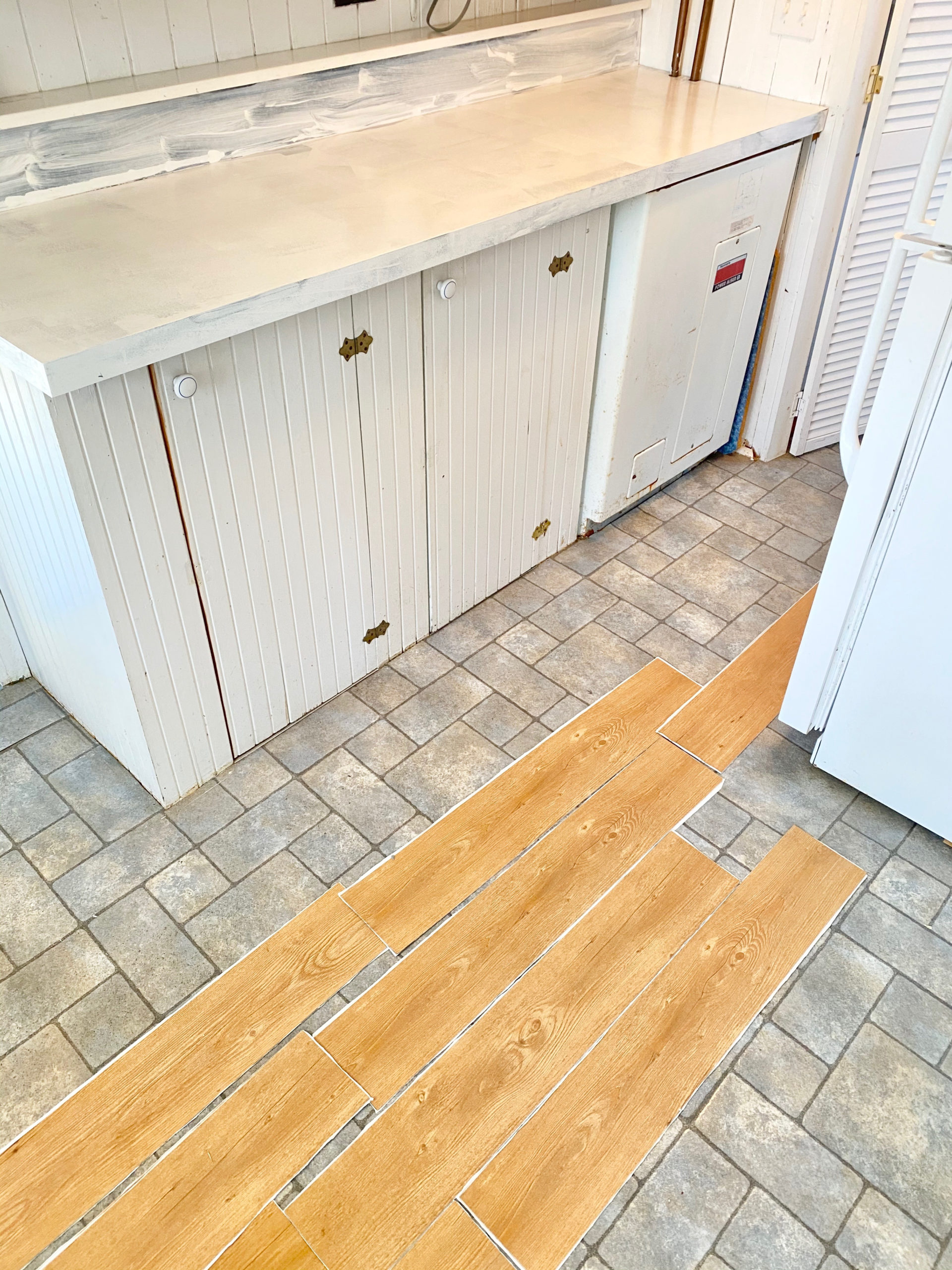 EASYDIYPeelandstickflooringmakeoverPinterestingPlansBlog