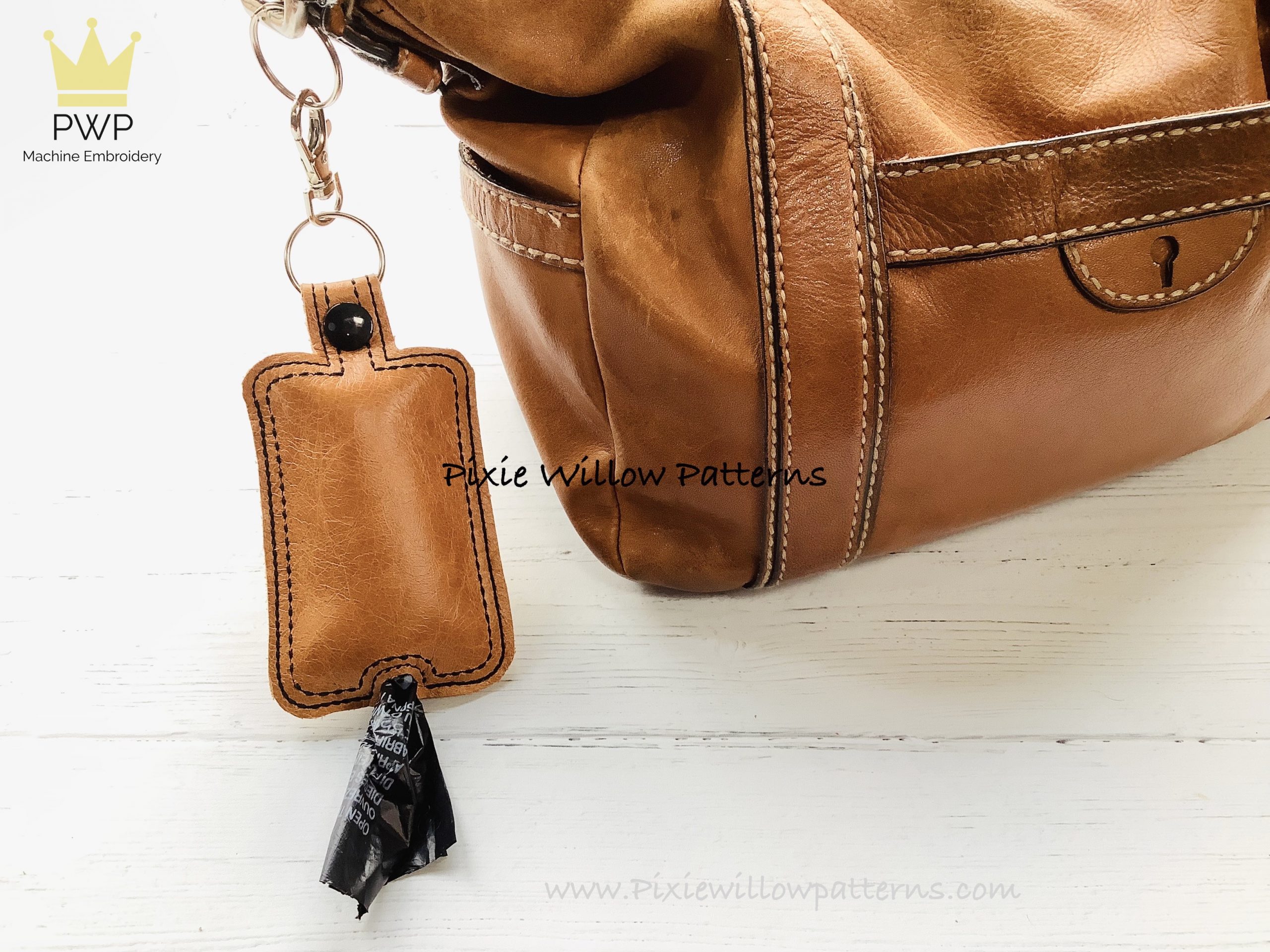 In the hoop Dog Poop Bag Holder pattern to fit a 5×7 hoop Pixie