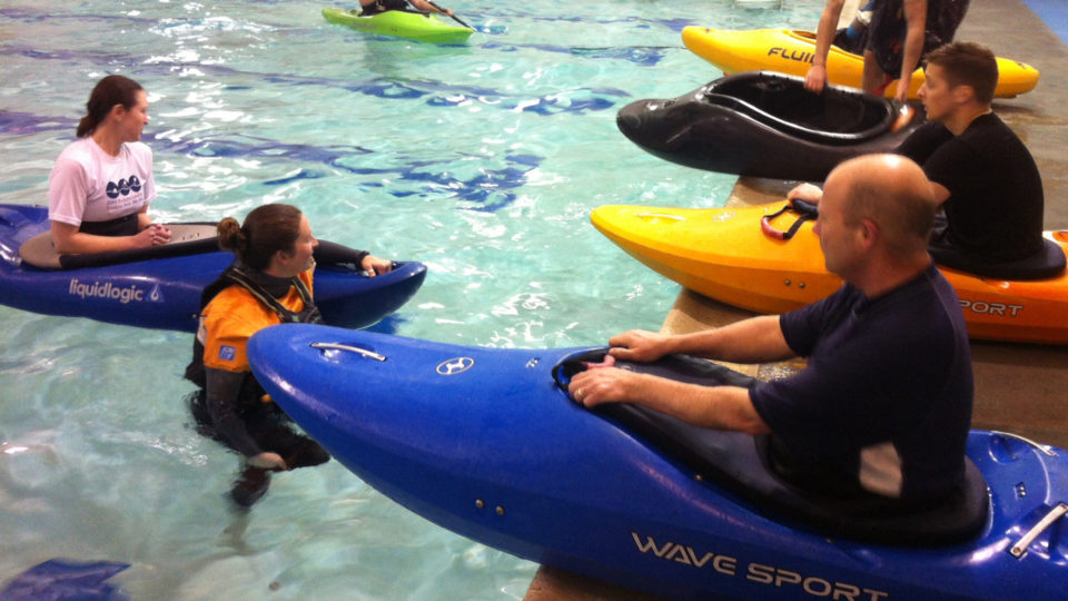 Kayak Rolling in an indoor pool