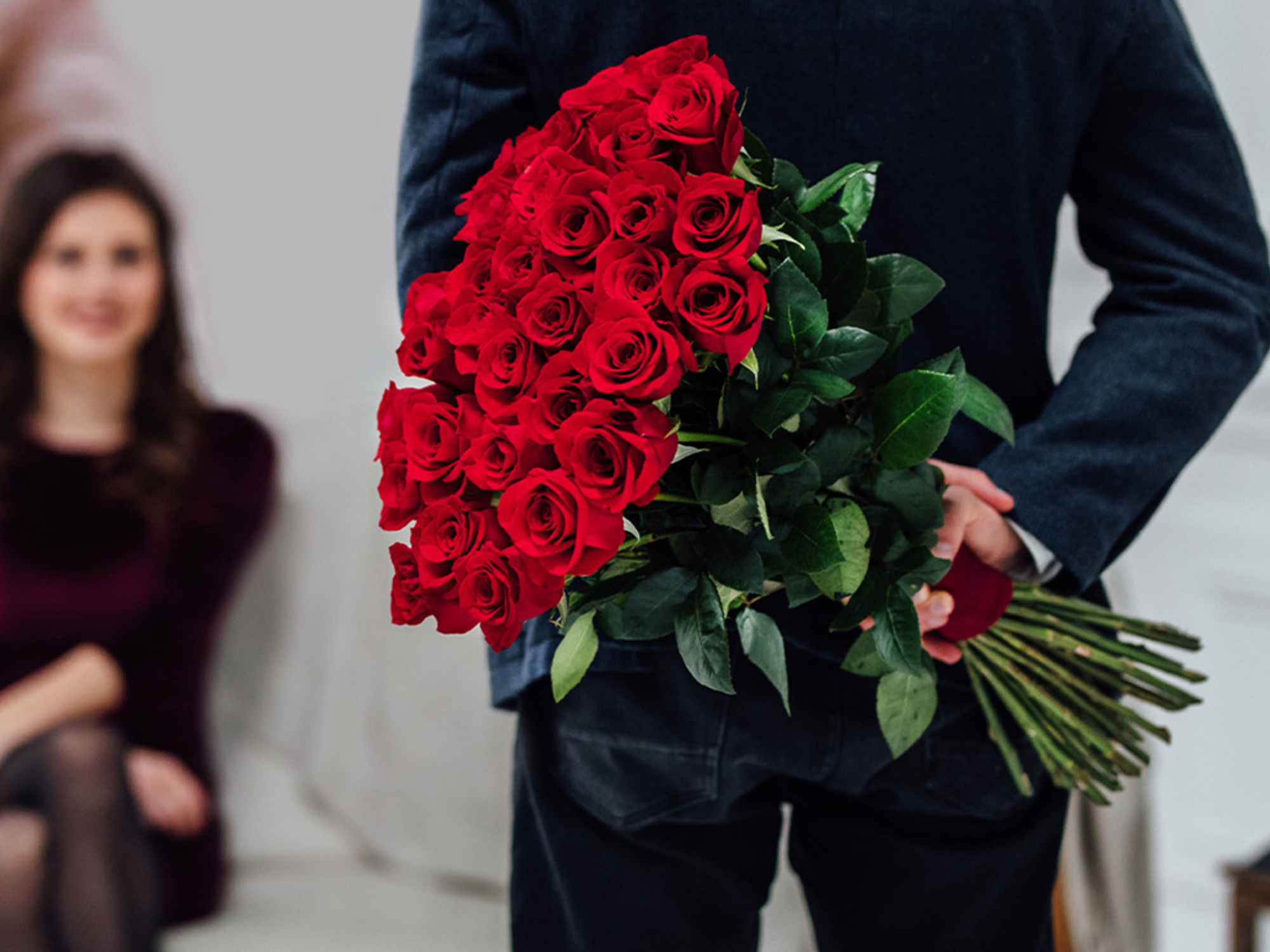 A Man Giving Roses To A Girl