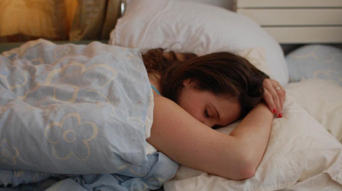 Sleep Better Tonight Lying Straight vs Lying on Your Stomach on Bed