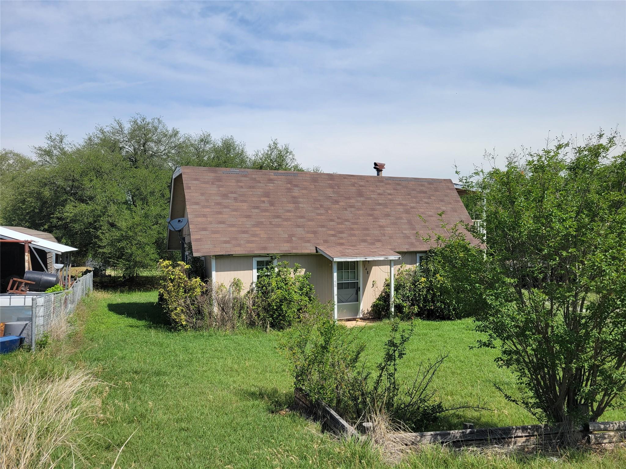 SOLD! Steps from Lake Proctor. Preferred Properties of Texas Home & Ranch Properties Stephenville