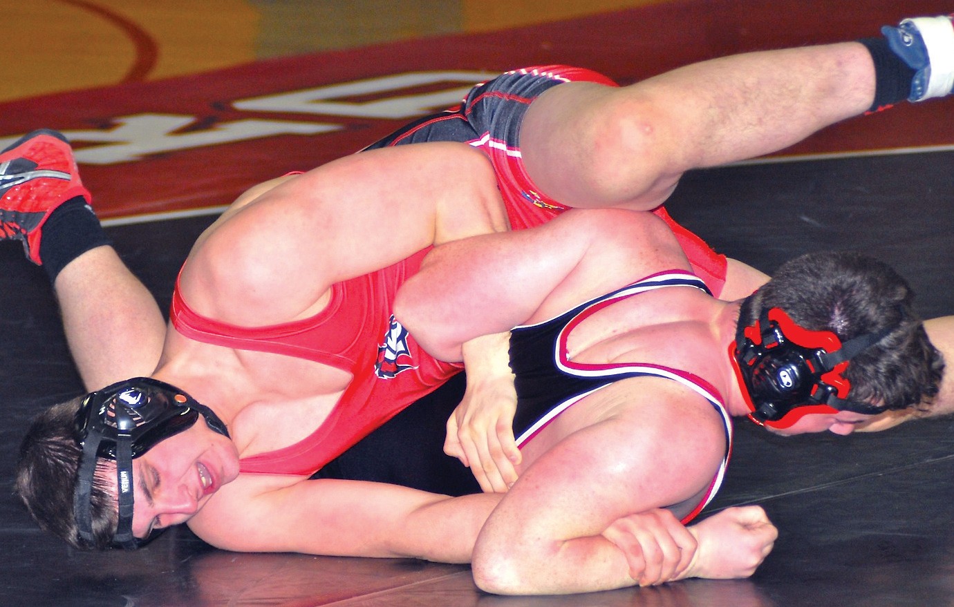 Sanford’s Mike Hurst tries to turn Scarborough’s Aren Dickman during their 195-pound match on Wednesday night.
